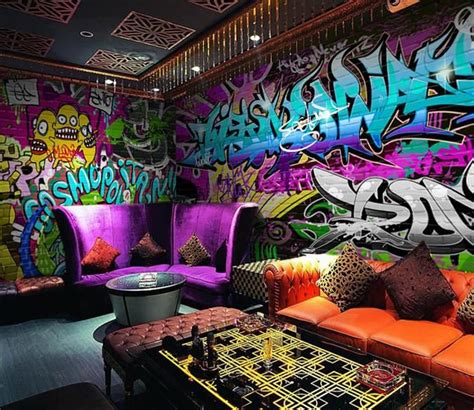 A Living Room Filled With Lots Of Furniture And Colorful Graffiti On