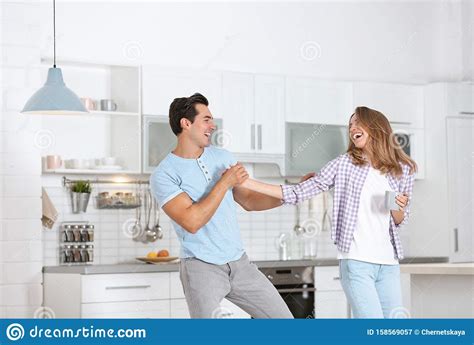 Beautiful Young Couple Dancing In Kitchen Stock Image Image Of