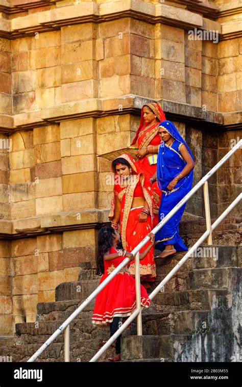 Worshipers Going Down Stairs Of A Temple Khajuraho Madhya Pradesh