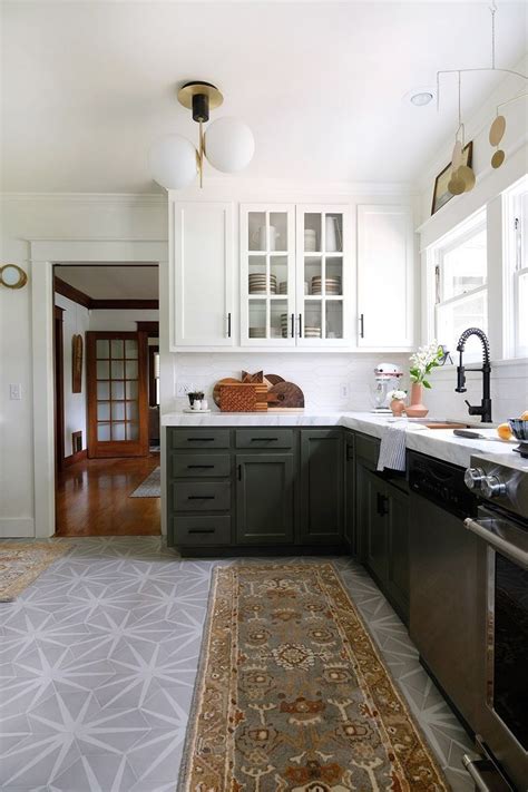 A classic tuxedo kitchen is typically defined by white upper cabinets and black lower cabinets, as a tuxedo kitchen ups the room's sophistication without requiring a great deal of time and effort to. tuxedo kitchen in 2020 | Modern kitchen flooring, Kitchen flooring options, Kitchen flooring