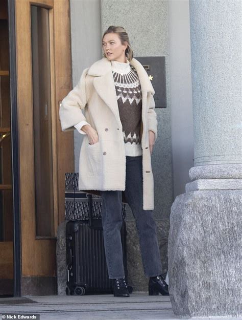Karlie Kloss Checks Out Of Hotel After Dasha Zhukovas Wedding Coat