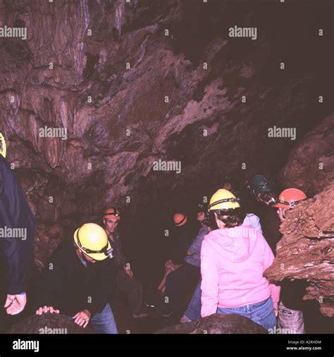Tourist Spelunkers Explore Riverbend Cave At Horne Lake Caves