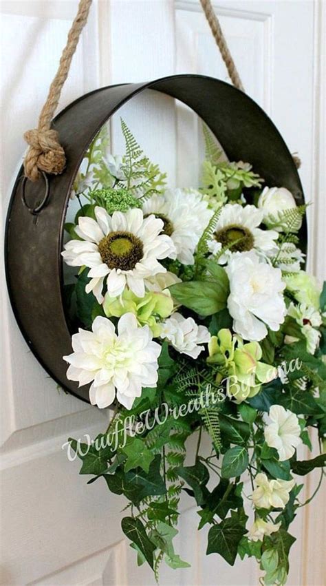 We used bright and colorful quality flowers and ribbon. Summer wreath on metal base | Silk flower wreaths, Metal ...