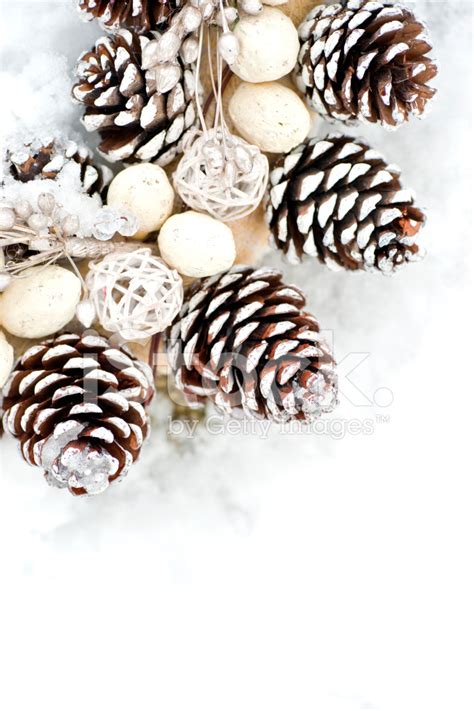 Pine Cone Wreath On Snow Covered Wall Stock Photo Royalty Free