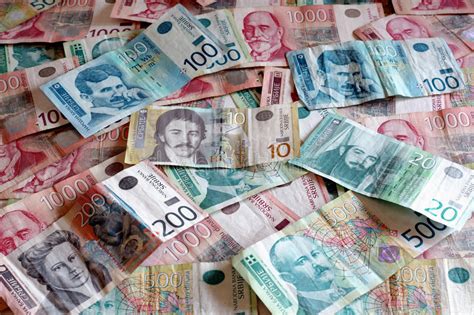 Currency rates in serbia, serbian dinar (rsd) and its rates in local banks and exchange officies. Serbian Currency - A Heap Of Dinar Banknotes Stock Photo ...