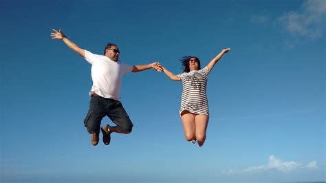 Free Images Hand People Fly Jump Jumping Love Blue Sky Casal