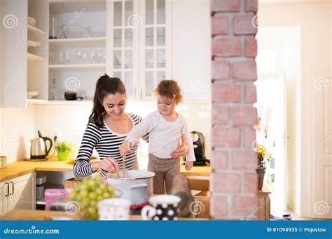 Mother With Her Daughter In The Kitchen Cooking Together Stock Image Image Of Relationship