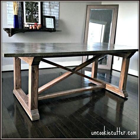 We cut them with a mitre saw at a 45 degree angle, and screwed them into the plywood with 5/8″ screws. Concrete Dining Table - DIY for less | Concrete top dining ...