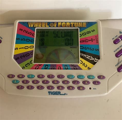 Tiger Wheel Of Fortune Vintage Handheld Electronic Game W Etsy