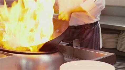 asian restaurant chinese chef cooking food man as skilled successful professional cook