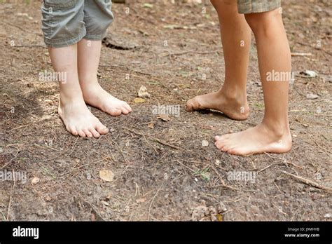 Boys´ Feet At Barefoot Trail Egestorf Lower Saxony Germany Stock