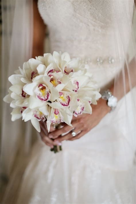 Commonly, to arrange cascade bouquets, it simply needs one type of flower either white autumn rose, pink orchid or other. Elena Damy - The Elegant Beauty of an Orchid Bouquet ...