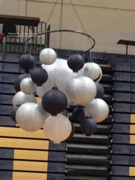 You can also create a net to hang your lanterns from on your venue's ceiling by tying several lengths of string to the room structure (a windows, details of the ceiling, tent's. 16" Silver Round Paper Lantern, Even Ribbing, Hanging ...