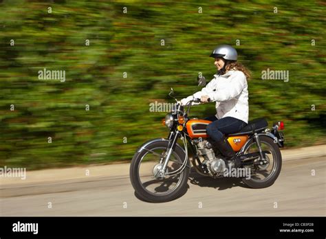 Teenage Girl Riding Motorcycle Stock Photo Alamy
