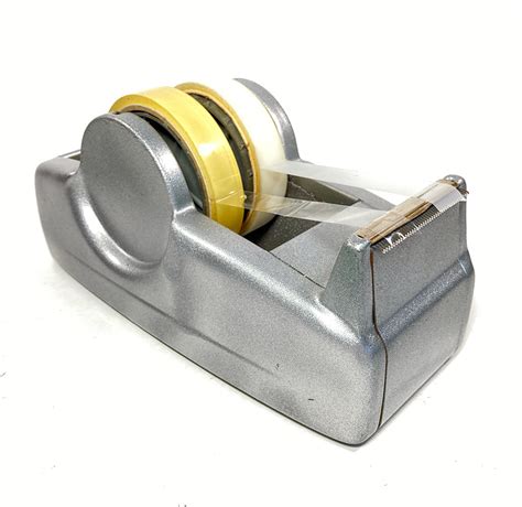 The natural rubber adhesive boasts high initial bond strength and adheres to a wide variety of materials. 1950-60's Scotch "DOUBLE" Cellophane Tape Dispenser ...