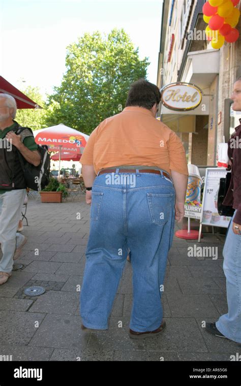 A Fat Man Walking Stock Photo Royalty Free Image 9115077 Alamy