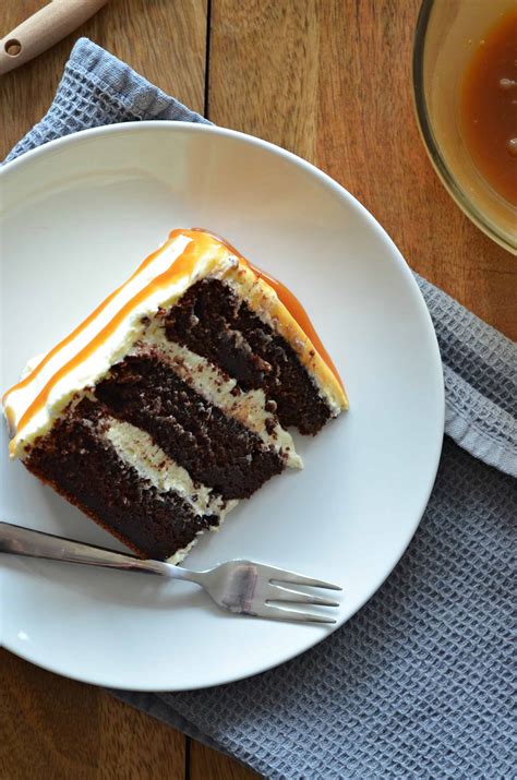 Chocolate Layer Cake With Vanilla Frosting And Salted Caramel Drizzle