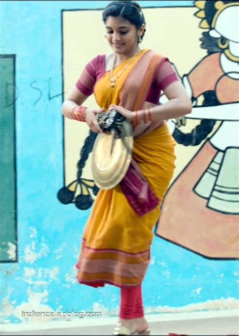nivetha thomas hot midriff show in sari hd caps
