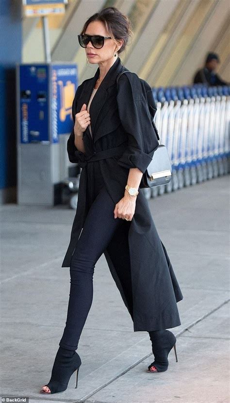 Victoria Beckham Prepares To Jet Off In A Chic Oversized Trench Coat Victoria Beckham Outfits