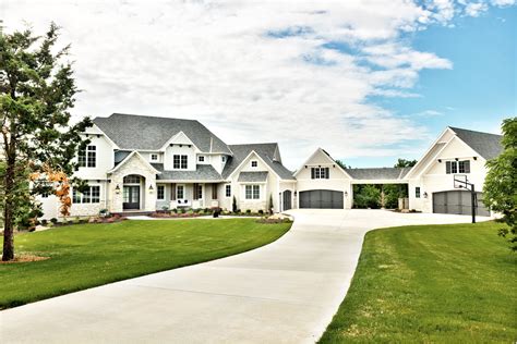 Large White Exterior Detached Garage Long Driveway Light Colored