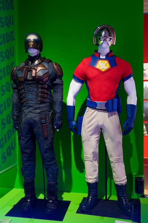 Bloodsport And Peacemaker Suits Exhibited At The Art Of Dc Expo In