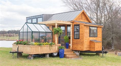In the daytime, sunlight shines into the greenhouse and warms the plants and air inside. Tiny Home on Wheels with Adjoining Patio and Green House ...