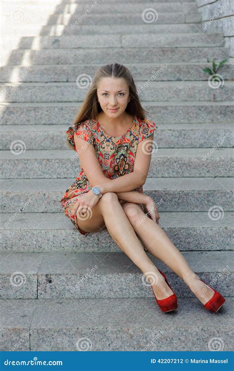 Woman In Dress Sitting On Stairs Stock Photo Image Of Pose Pretty