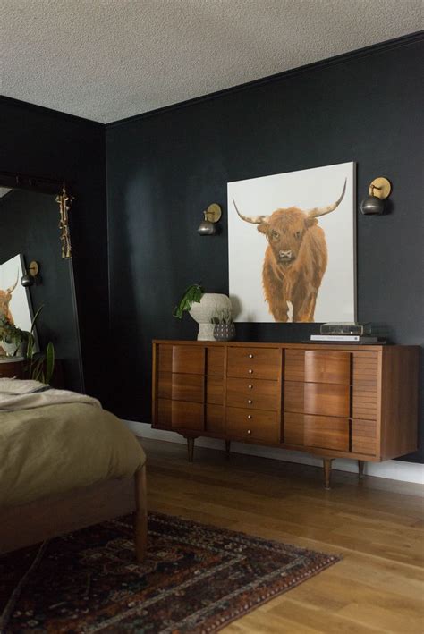 The company primarily engages in the manufacture, distribution. Sherwin Williams Tricorn Black Bedroom featuring ...