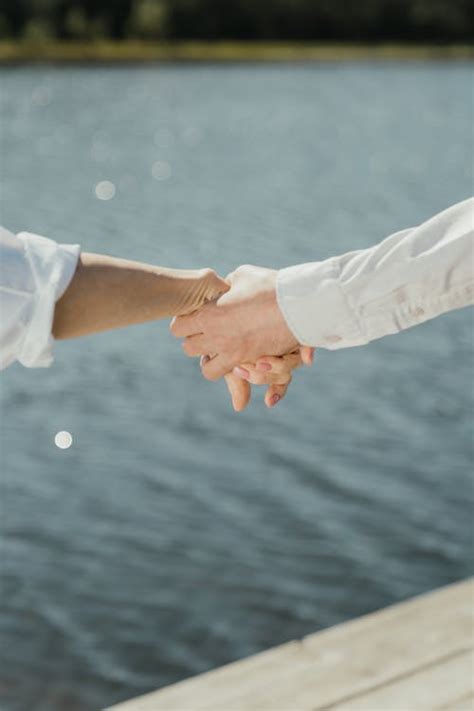 Man And Woman Holding Hands · Free Stock Photo