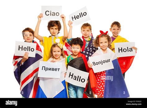 Kids Holding Greeting Signs In Different Languages Stock Photo Alamy