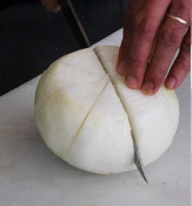 Flip the onion cut side down. How to Make Blooming Onion - Cooking - Handimania