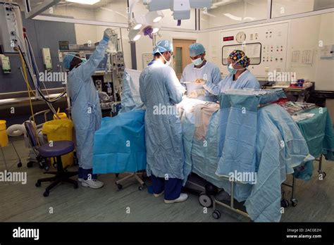 Hernia Operation Surgeons Performing Surgery To Repair An Epigastric