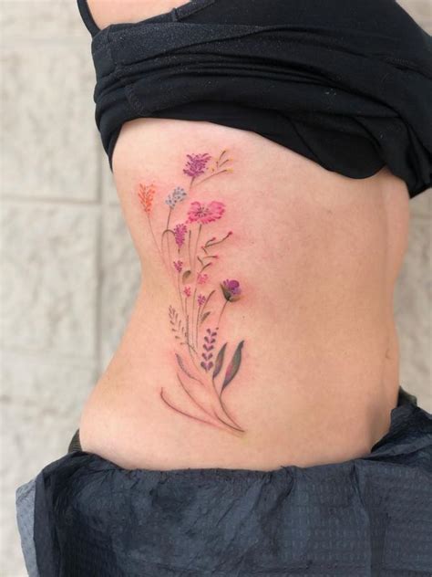 Delicate Fine Line Floral Tattoo By Drew Tattoos