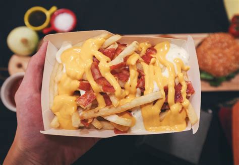 Mcdonalds Launches Cheesy Loaded Fries With Chicken Bacon Bits Nacho