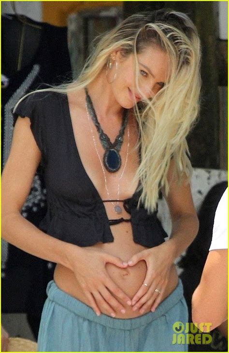 Candice Swanepoel Shows Off Her Baby Bump At The Beach Photo