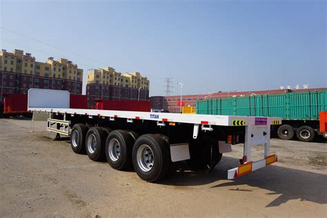 4 Axle 60ton Heavy Trailer Truck 40ft Container Flatbed Container Semi
