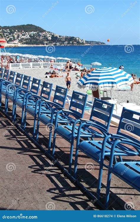 View Of Row Of Chairs And Umbrellas On Beach In Nice Editorial Stock