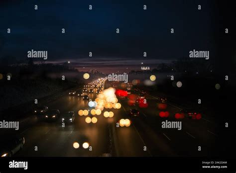 Double Exposure Of Cars Driving On An Interstate Highway At Night Stock