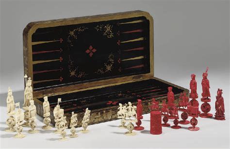 A Chinese Black Lacquered Chess Board And Complete Ivory Chess Set