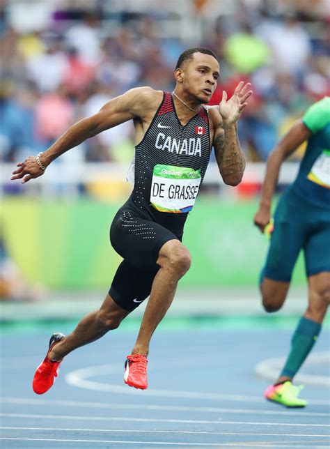 #degrassi #summer #olympics #de grasse #andre de grasse #running #200m #100m #usain bolt #jamaica #canada #sports #sport #sprint #sprinter #debolt degrasse and usain's smiles at each other while they ran side by side is my new fav part of the olympics. Andre de Grasse in Athletics - Olympics: Day 11 - Zimbio