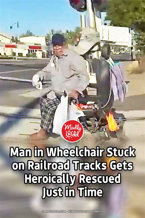 Pin Man In Wheelchair Stuck On Railroad Tracks Gets Heroically Rescued Just In Time Madly Odd