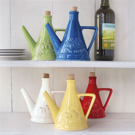 Most oil producers are aware that olive oil must be stored in opaque storage containers constructed of inert material such as glass or stainless steel. Italian Olive Oil Bottles | Products I Love | Pinterest ...
