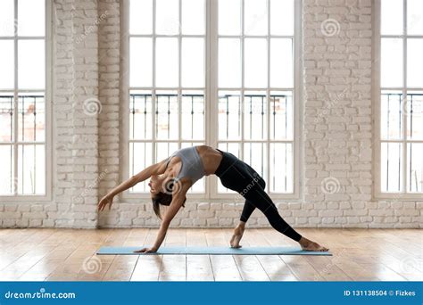 Young Sporty Attractive Woman Practicing Yoga Doing Wild Thing Stock