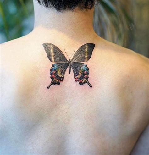 Butterfly Tattoo On The Upper Back