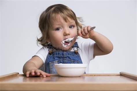 Cute Little Boy Eating Porridge Stock Image Image Of Cute Blue 80443927