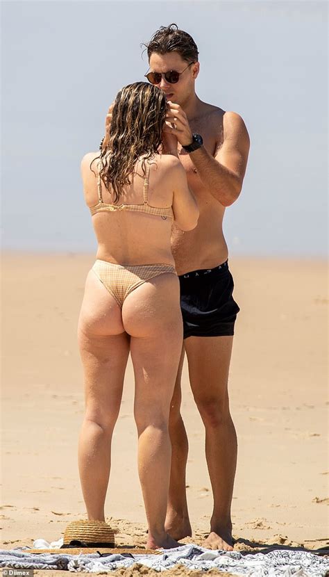 Abbie Chatfield And Todd King Share A Steamy Kiss During A Risqué Beach