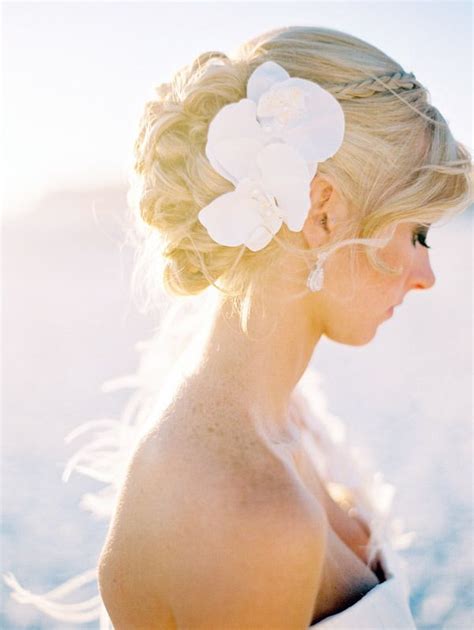 Modern beach wedding hairstyles are slightly unconventional. 20 Breezy Beach Wedding Hairstyles