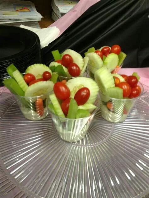 This is a simple fruit salad with fresh berries, mango, banana, and orange. Single serve vegetable..ranch.dressing in tj bottom ...