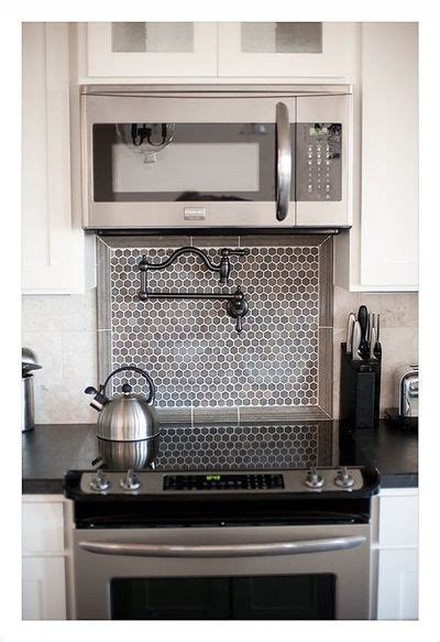 How to install a cabinet filler strip. faucet over stove - Google Search | Kitchen backsplash ...