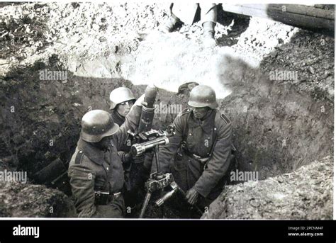 World War Two Bandw Photo A German Mortar Crew Load Their Weapon On The